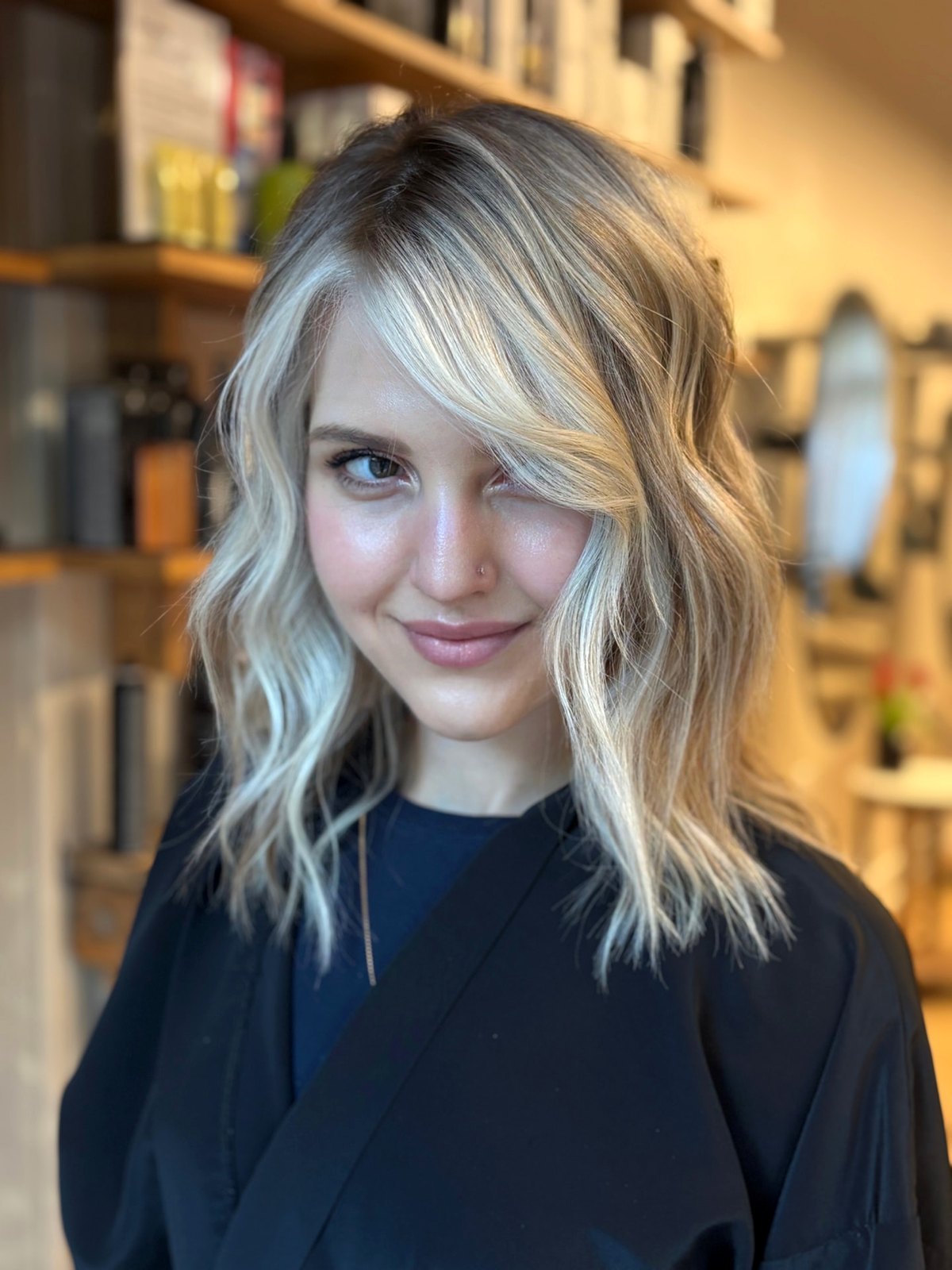 Finished lived-in blonde lob with soft beachy waves