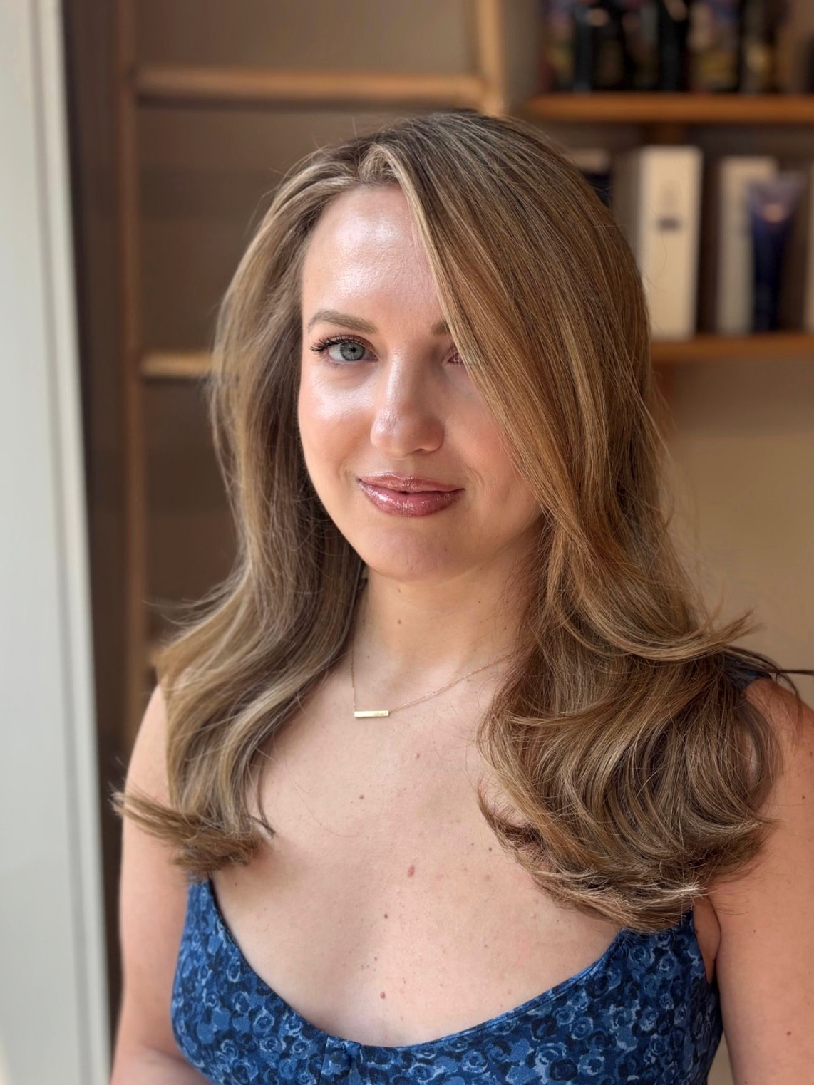Finished bronde blowout with sculpted volume and shine
